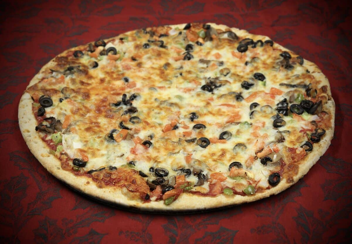 Veggie Cheese, Mushrooms, Onions, Green Peppers, Black Olives, & Tomatoes